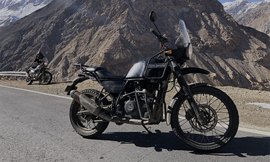 Manali to Leh bike trip, Leh Ladakh bike trip, Himalayan bike adventure, Manali Leh highway, Rohtang Pass bike ride, Ladakh road trip, high altitude biking, AMS prevention tips, bike rental Manali, Leh Ladakh tour, best route Manali to Leh, adventure biking in India, Ladakh travel guide, Himalayan Rider tour, Manali to Leh fuel stops, Ladakh accommodation options, extreme terrain biking, mountain pass road trip, Leh Ladakh tourism, best time for Manali Leh ride