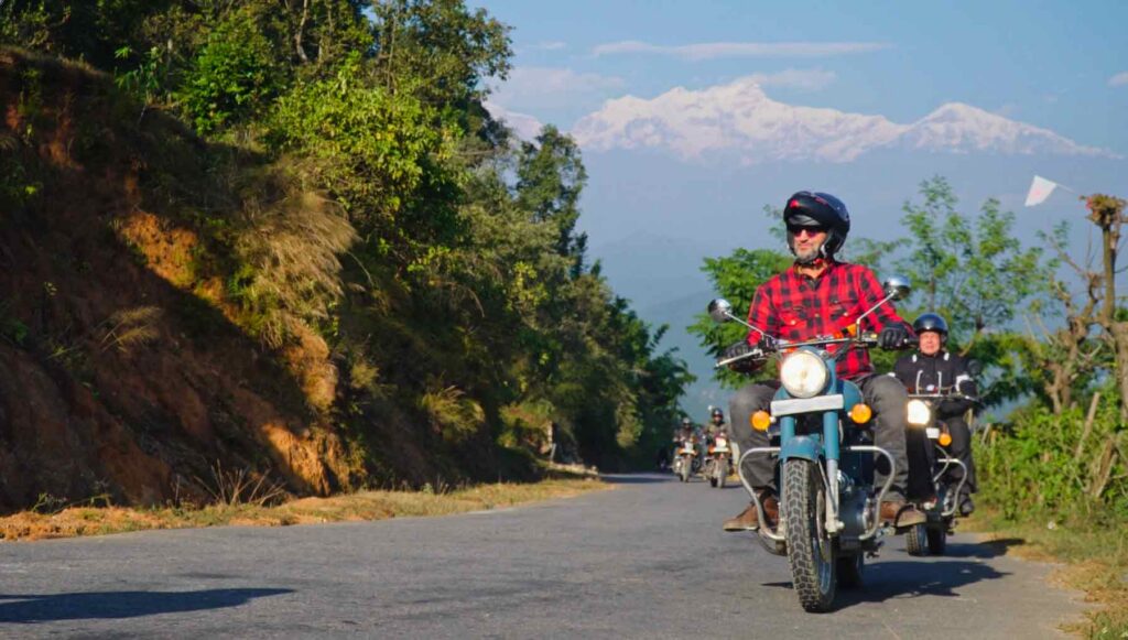 Nepal bike tour, motorcycle adventure in Nepal, best biking routes in Nepal, Kathmandu to Pokhara bike trip, Mustang Valley motorcycle ride, biking in Nepal, high-altitude motorcycle tours, permits for biking in Nepal, road trip Nepal, off-road biking Nepal, best time for biking in Nepal, Nepal motorcycle rental, riding in the Himalayas, cultural experiences in Nepal, biking challenges in Nepal, fuel availability in Nepal, adventure tourism Nepal, Nepal biking tips, motorcycle-friendly destinations in Nepal, Lumbini bike trip